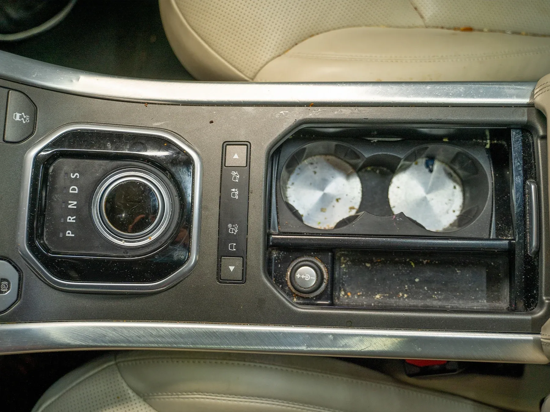 Centre console before professional interior cleaning
